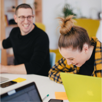 Laughing with colleagues